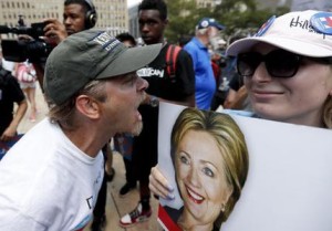 Demonstrators square off during a rally outside City Hall in Philadelphia, Wednesday, July 27, 2016, during the third day of the Democratic National Convention. (AP Photo/Alex Brandon)